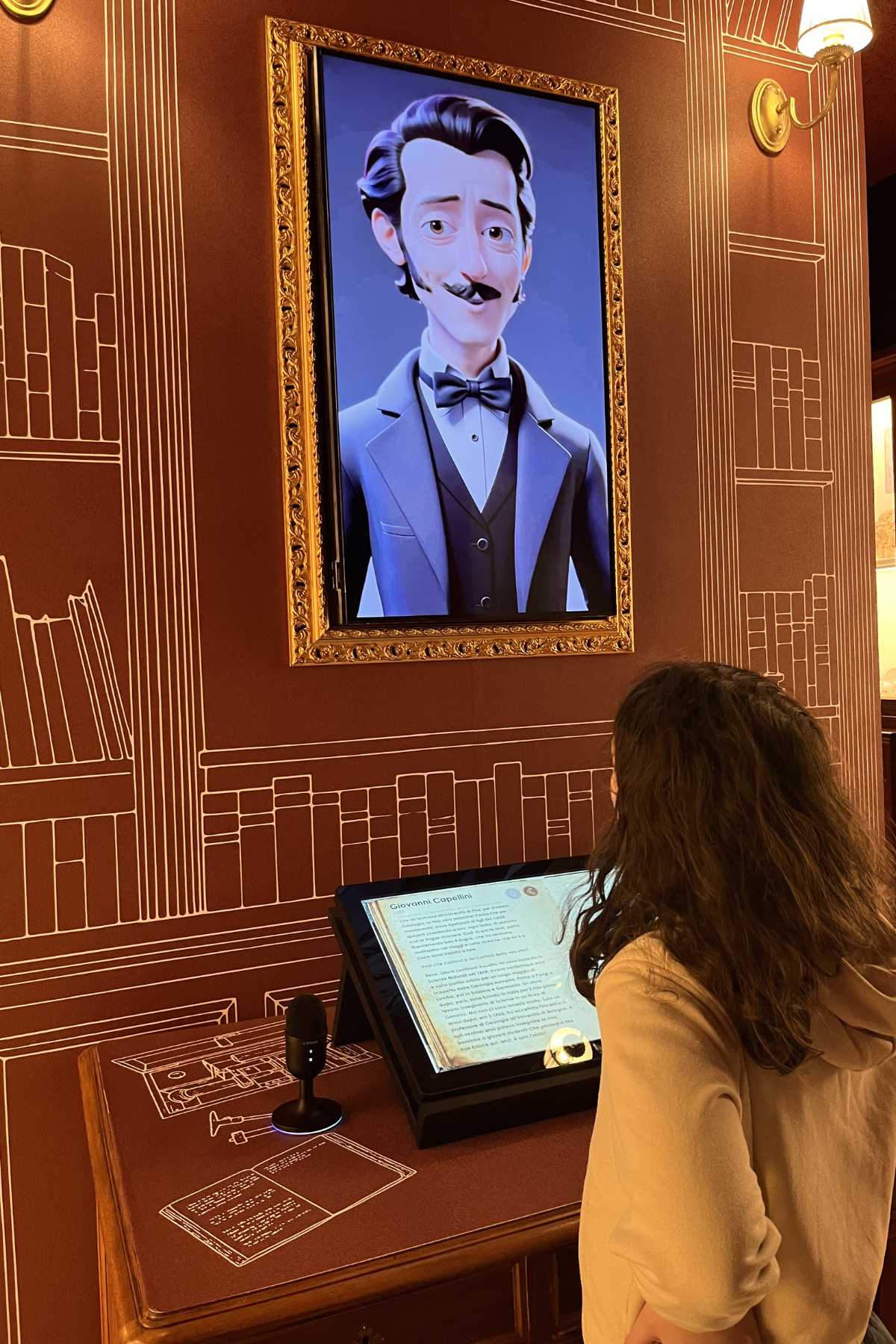 schermo interattivo con personaggio all'interno del museo capellini, tra i musei per bambini di Bologna
