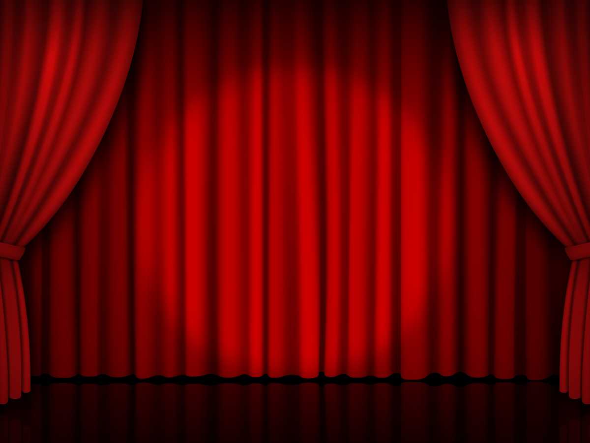 Sipario rosso di teatro che si apre, spettacoli per bambini e famiglie 