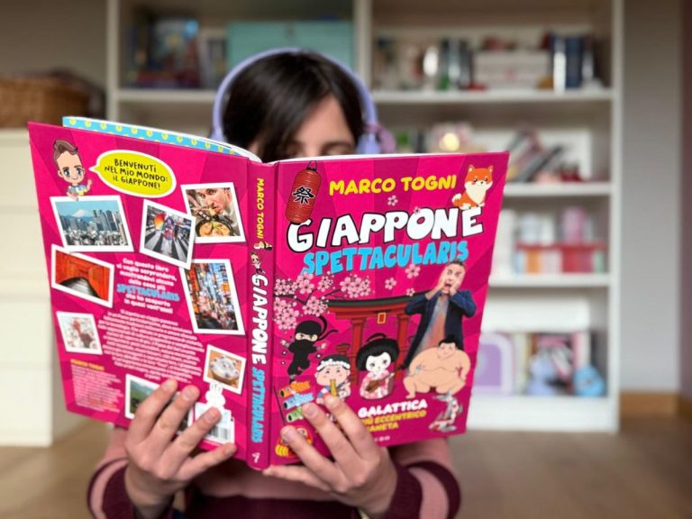 ragazzina legge libro sul giappone